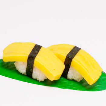 Tamago Nigiri ( 2 Stück) Tamago Nigiri ( 2 Stück)