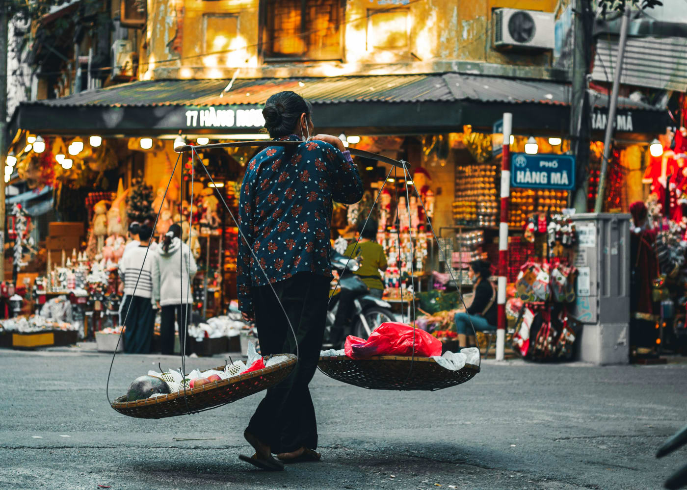 Authentic street food market with various colorful stalls presenting exciting dishes from around the world, perfect for inspiring your party menu.