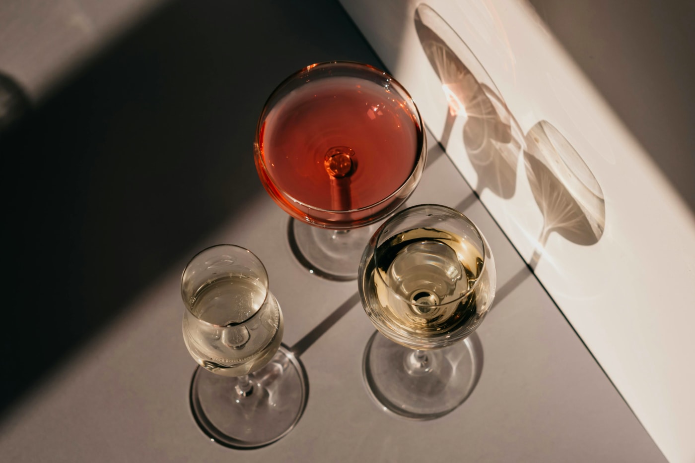 Various cocktails presented in elegant glasses, highlighting serving tips for the New Years party.