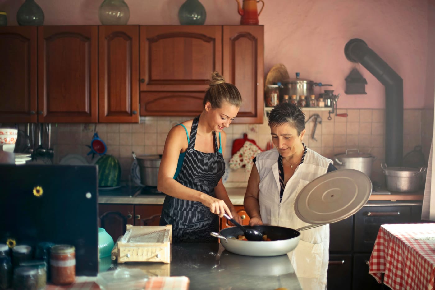Professional chef cooking in a cozy kitchen, illustrating a personal and customized dining experience with ChefMe.