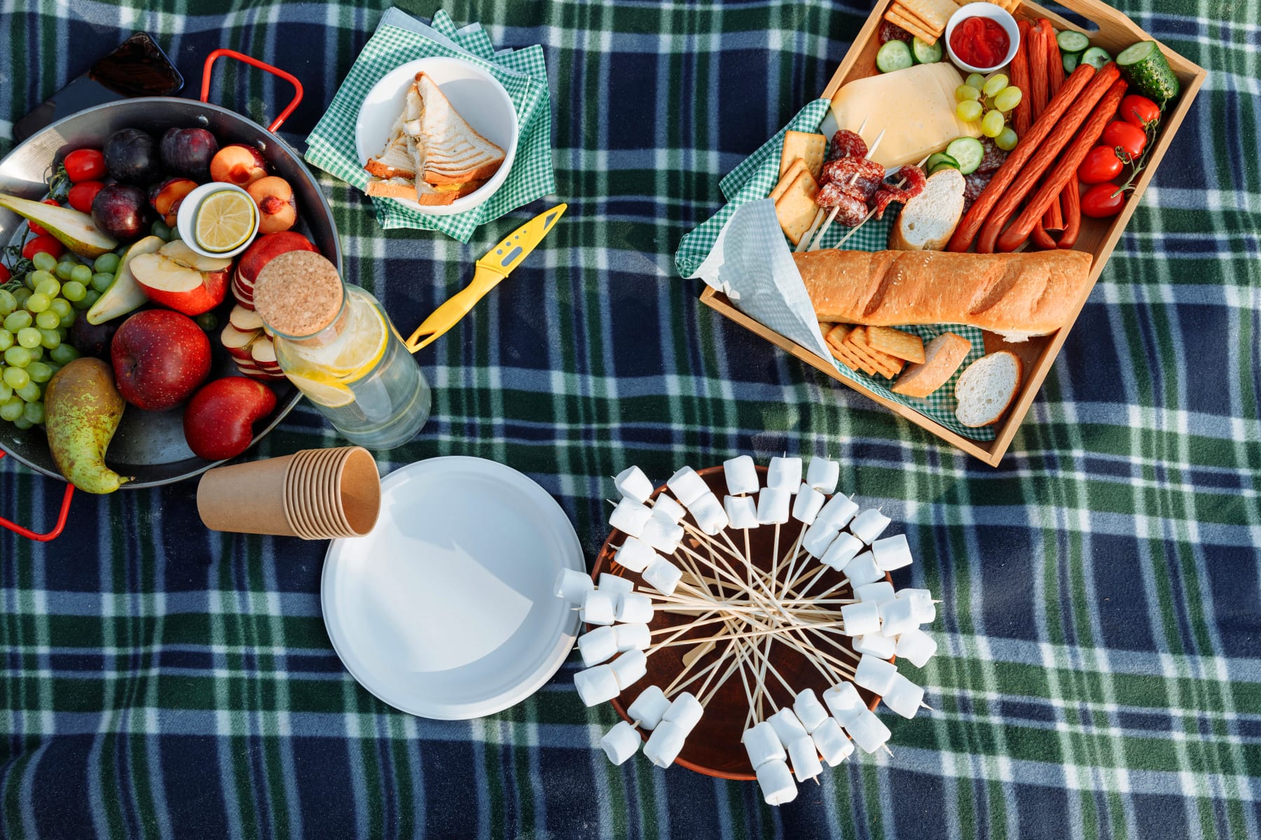 Picnic arrangement with fruit, charcuterie, and snacks, which is perfect for the DHL Relay 2025.