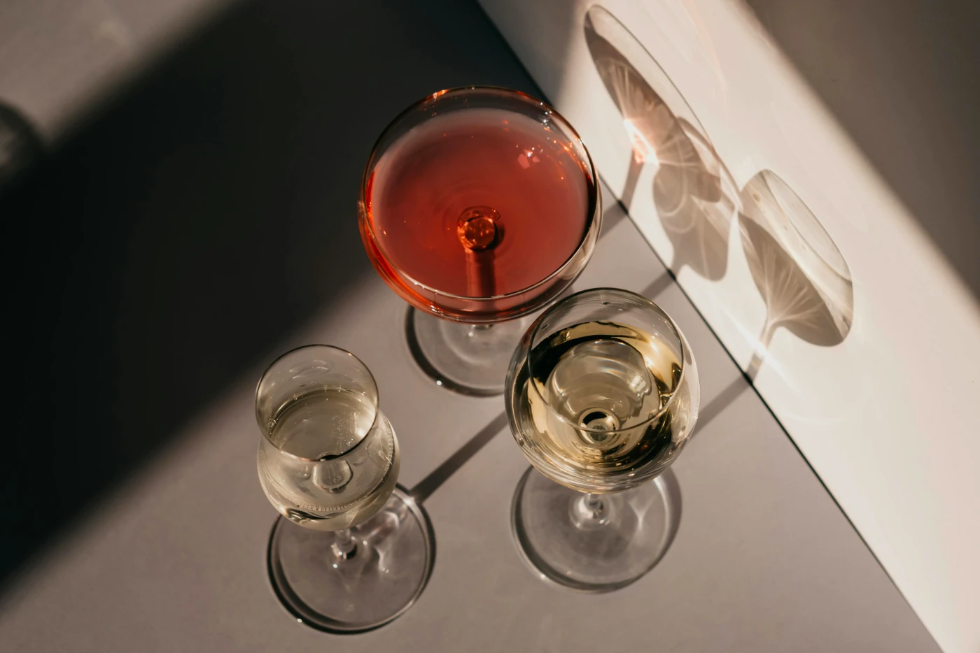 Various cocktails presented in elegant glasses, highlighting serving tips for the New Years party.