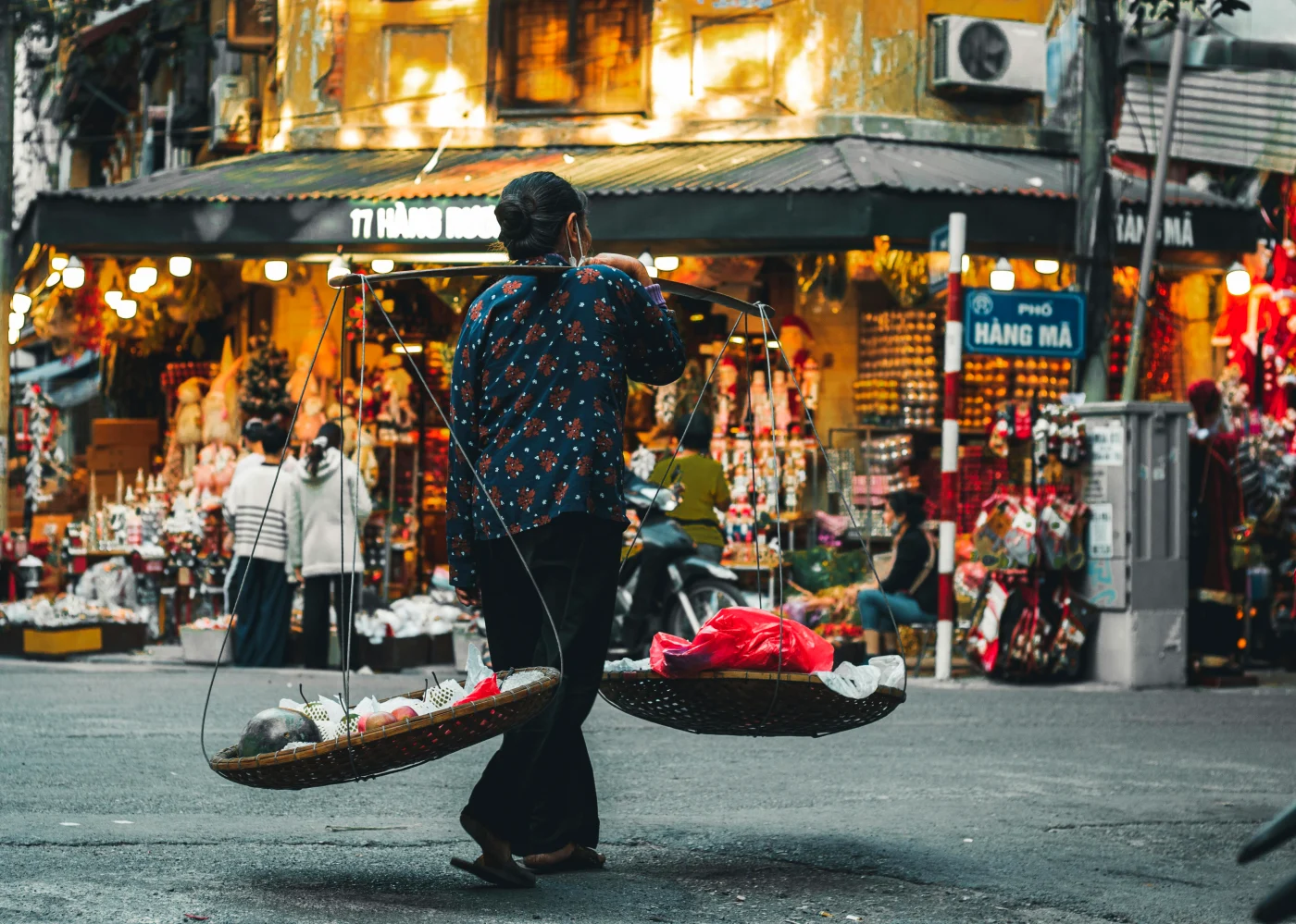 Authentic street food market with various colorful stalls presenting exciting dishes from around the world, perfect for inspiring your party menu.