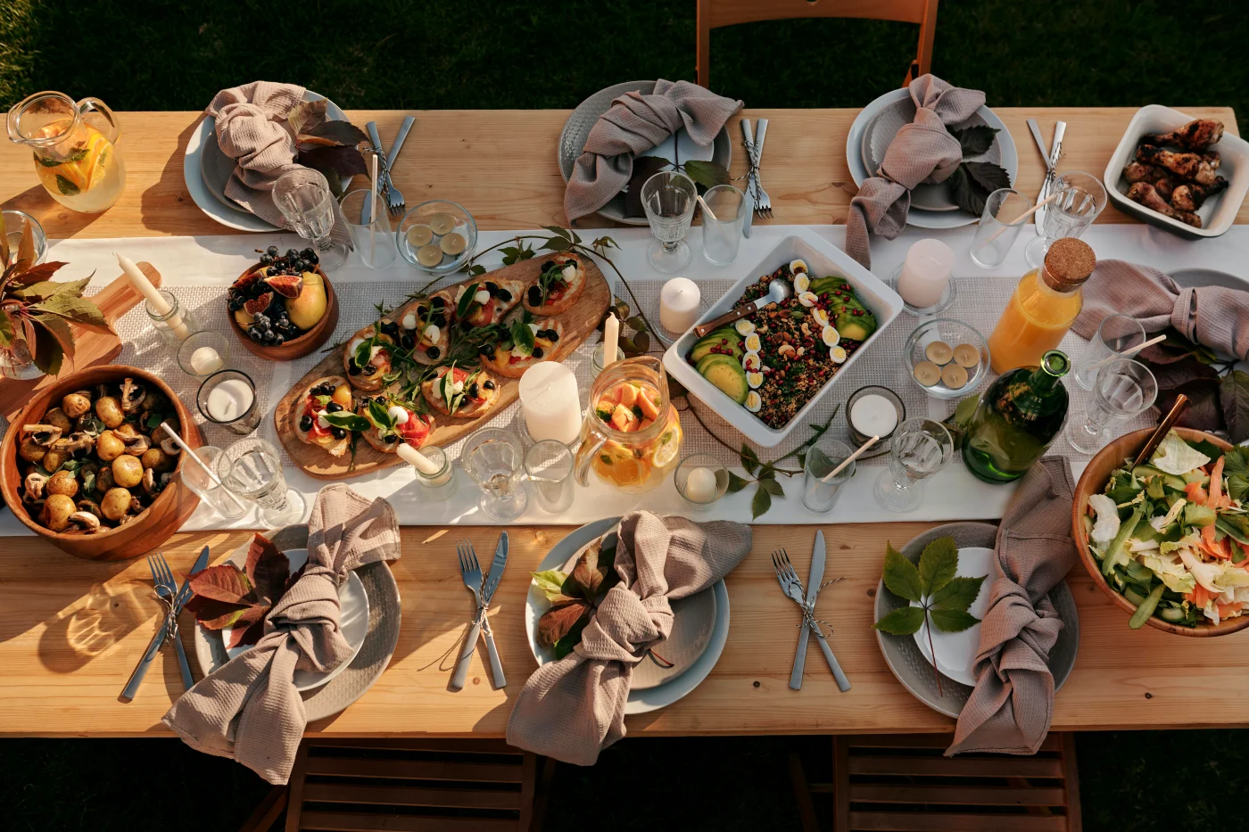 An inviting table setting with various vegetarian dishes like falafel wraps, vegetable tarts, and bruschetta, perfect for late-night snacks and plant-based alternatives.