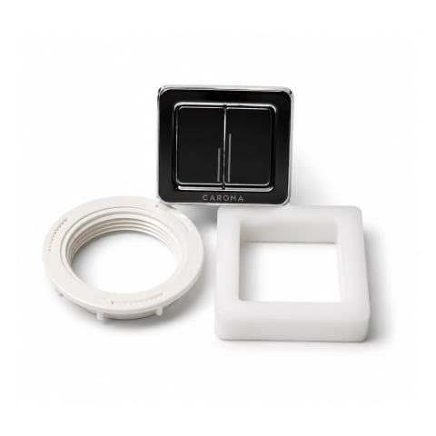 Caroma Cube dual flush button kit with black flush plate, white mounting ring, and spacer, isolated on a white background