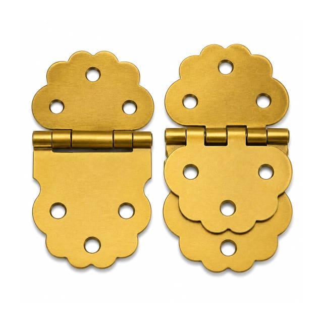 Pair of decorative brass hinges with scalloped edges displayed open and partially folded on a white background.