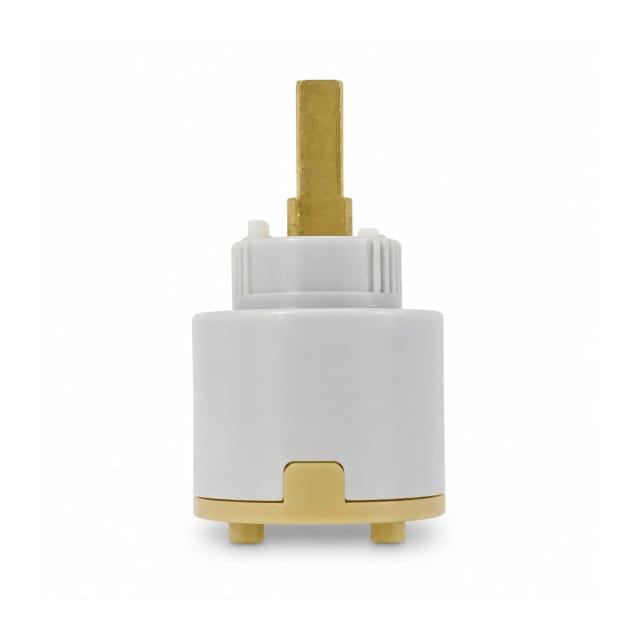 White and brass tap cartridge replacement part on a white background