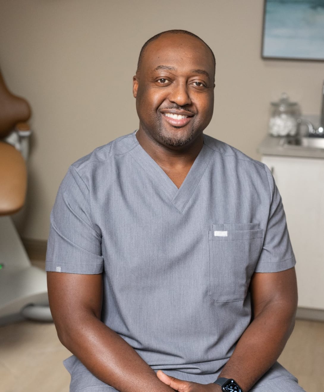 An Orahh Care dentist seated in a treatment room
