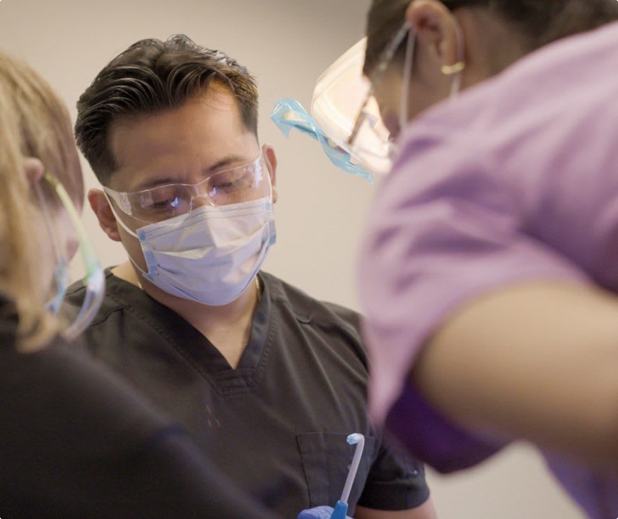 A patient talking with their Orahh Care dentist about payment options