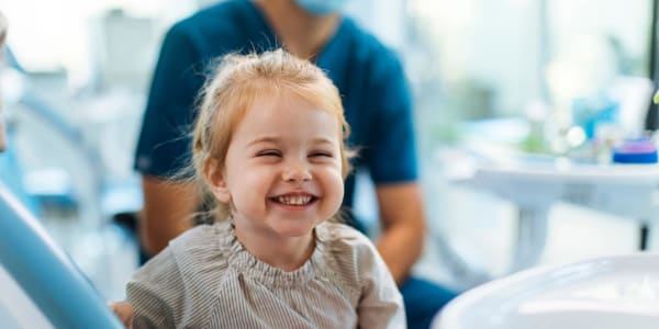 Smiling little girl at the dentist