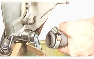 Disconnecting radiator bottom hose when no drain plug is available — AutoClinic
