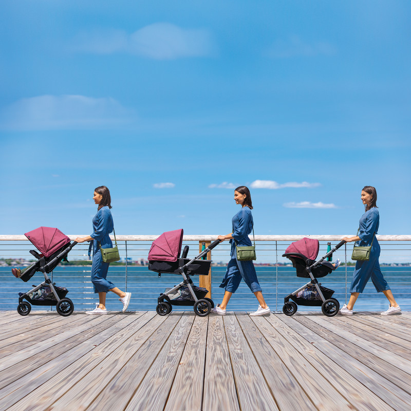 Pivot® Modular Travel System With Safemax™ Car Seat (Dusty Rose) Lifestyle Photo Pivot® Modular Travel System With Safemax™ Car Seat (Dusty Rose) Lifestyle Photo