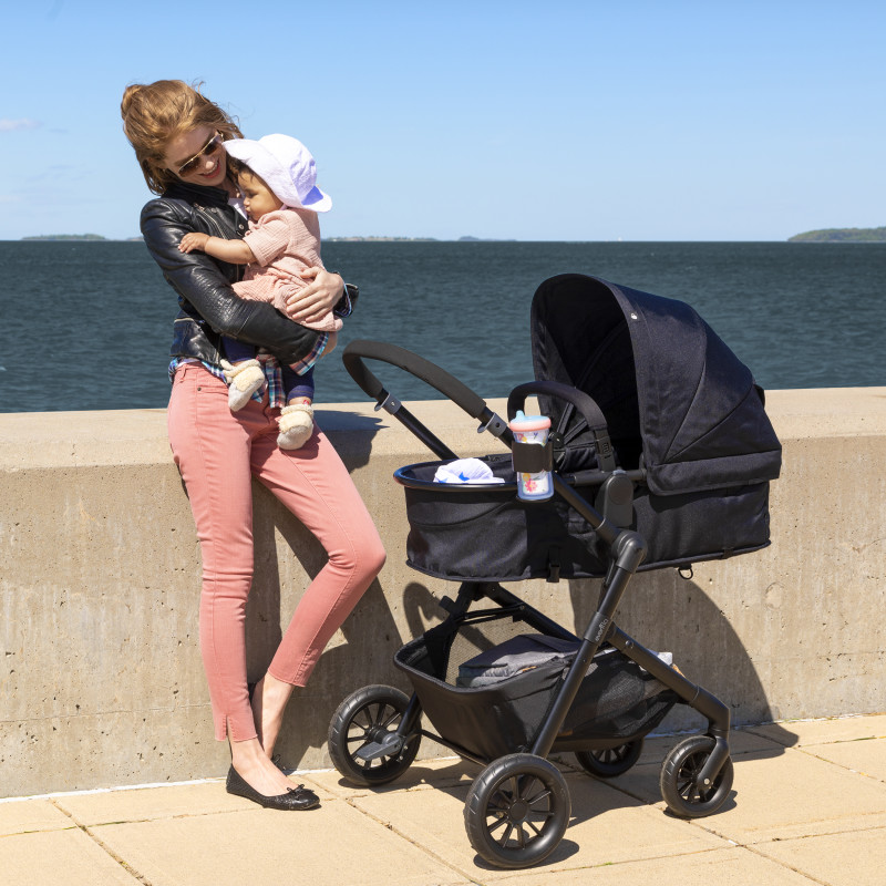Pivot® Modular Travel System With Safemax™ Car Seat (Dusty Rose) Lifestyle Photo Pivot® Modular Travel System With Safemax™ Car Seat (Dusty Rose) Lifestyle Photo