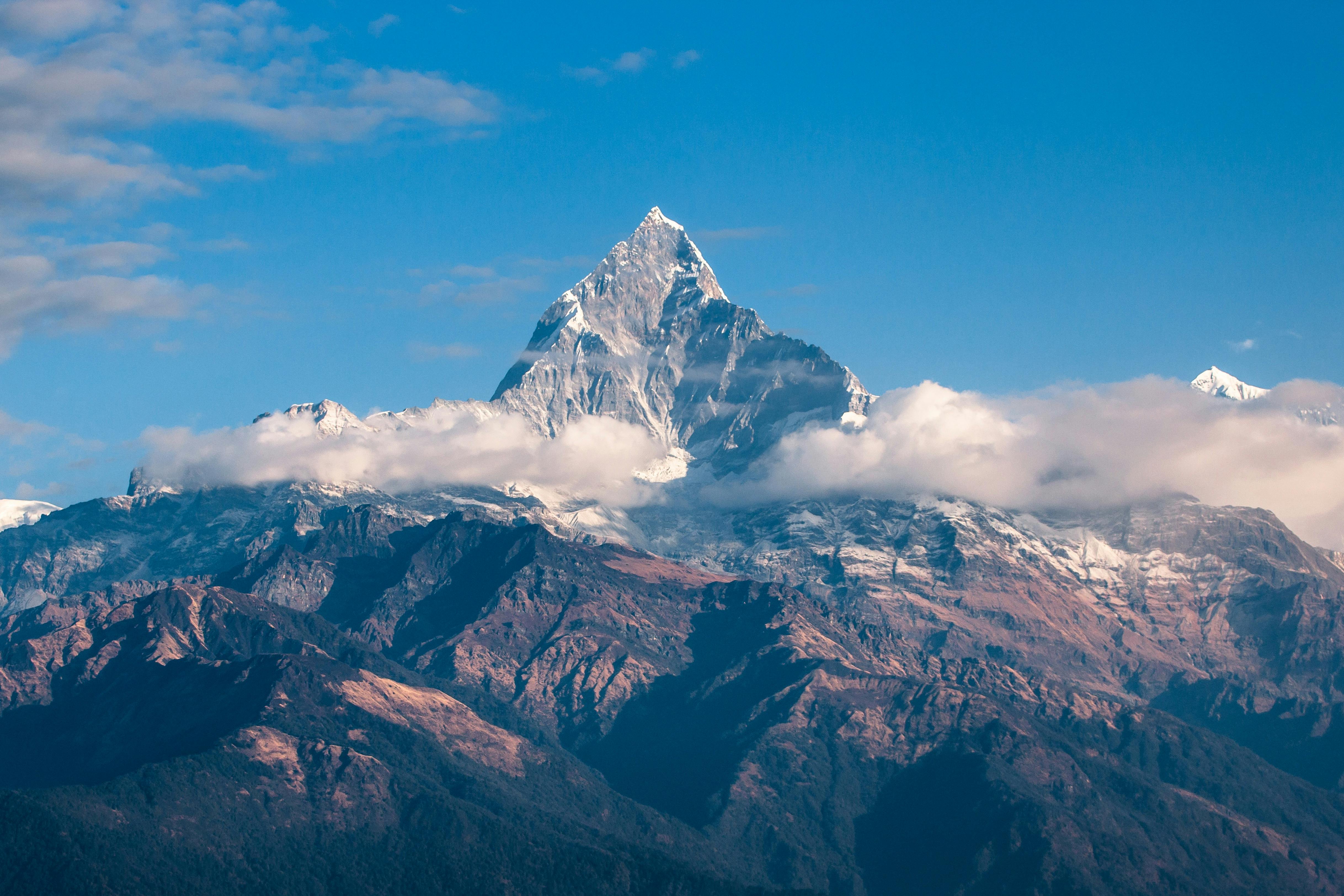Scenic view of forested mountains under a clear sky, perfect for nature lovers.