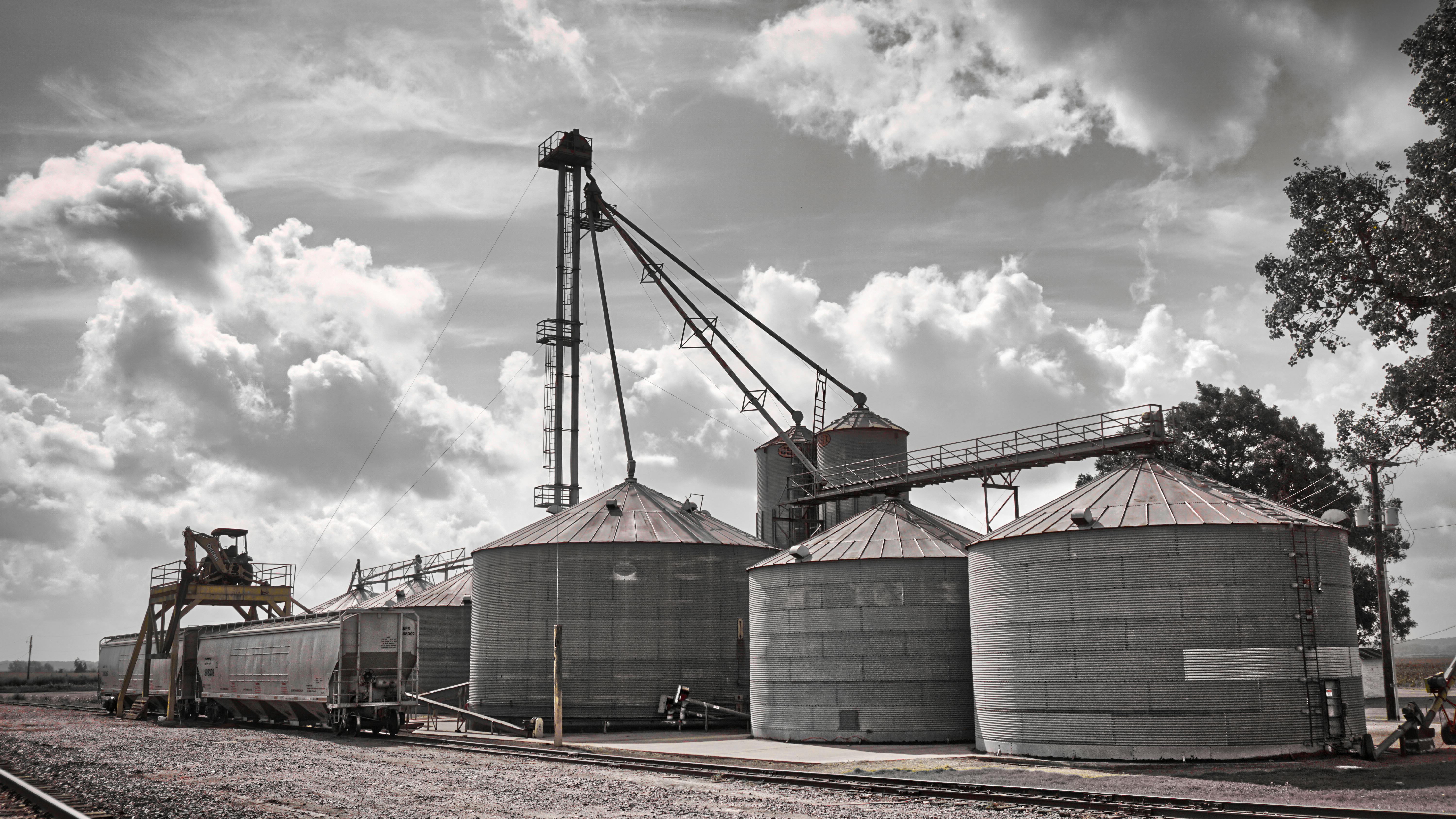 Scenic view of industrial grain silos and a train at Allen Farm, TX.