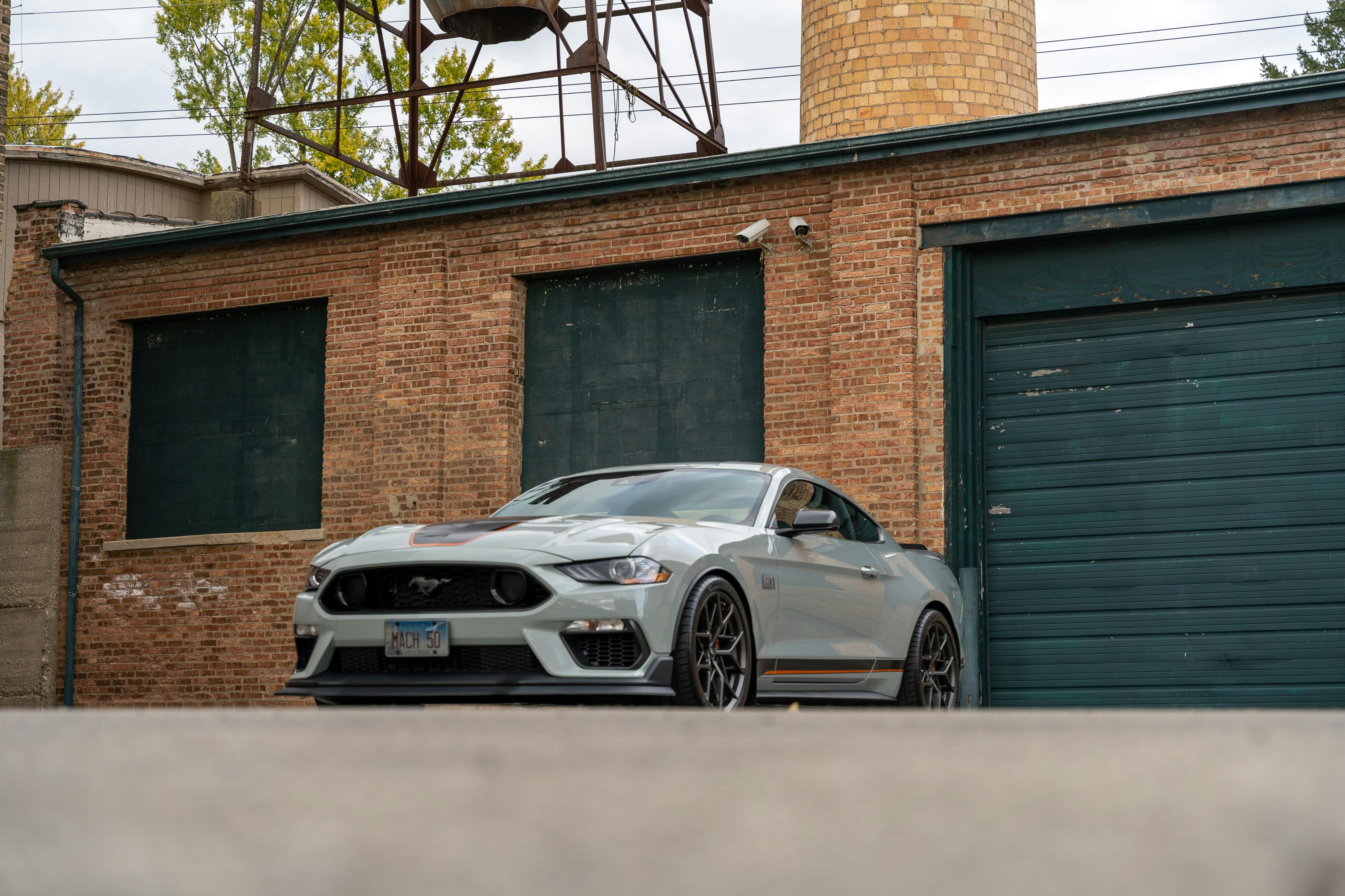 Detailed image of a sleek modern car control panel with touchpad and control buttons.
