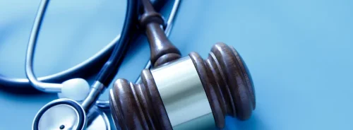 Gavel with stethoscope symbolising healthcare law and regulation.&nbsp;