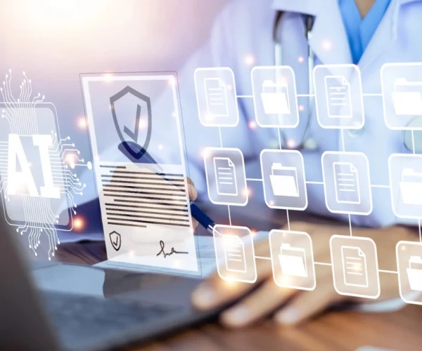 Doctor using AI to manage secure electronic health records and data privacy workflows.&nbsp;