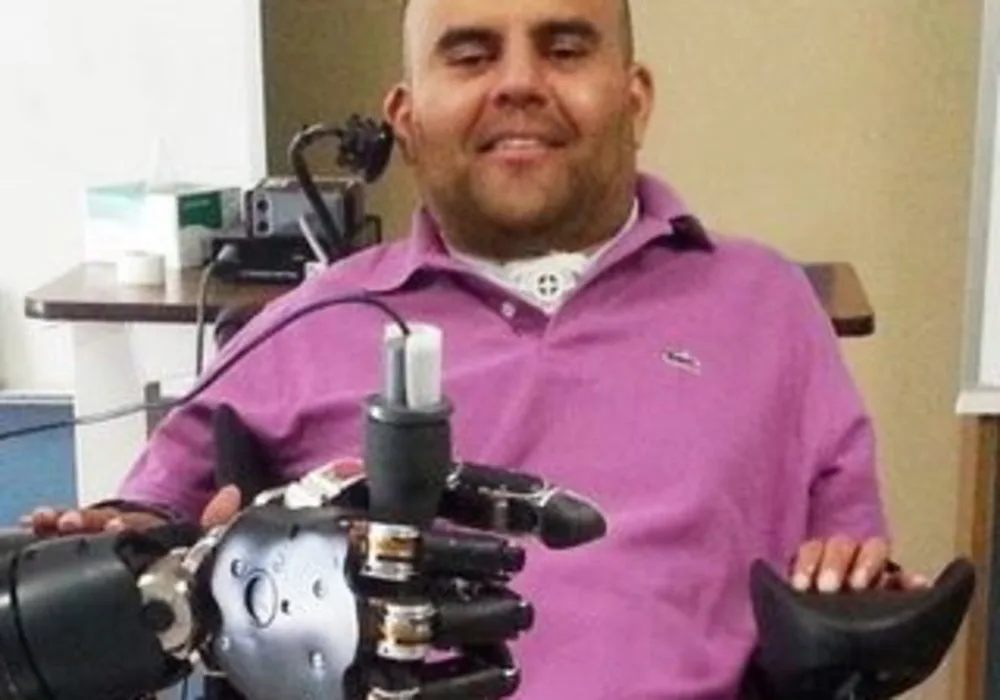 Patient with neural prosthetic device 