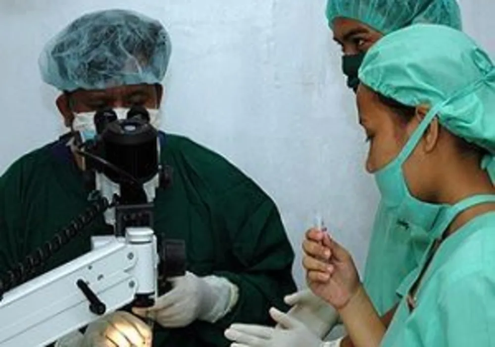 medical students assisting a surgeon