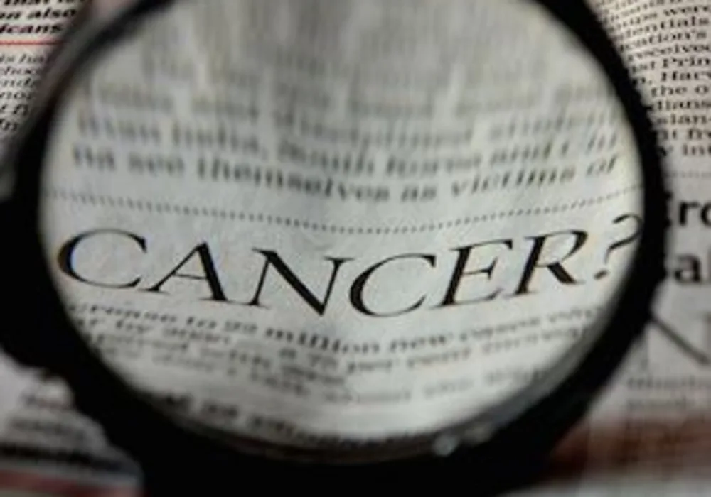 Cancer written in newspaper, credit Pixabay