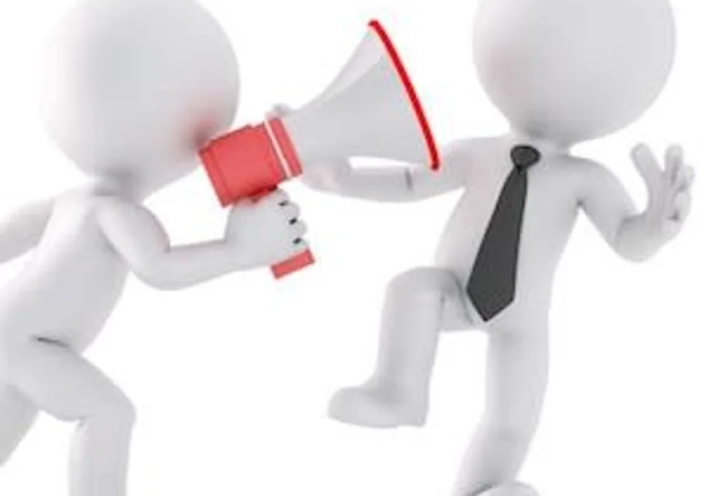 Cartoon of person with megaphone shouting at another person, credit Pixabay