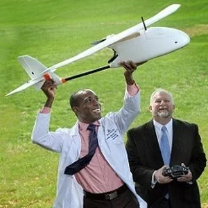 Dr. Timothy Amukele testing a drone courier