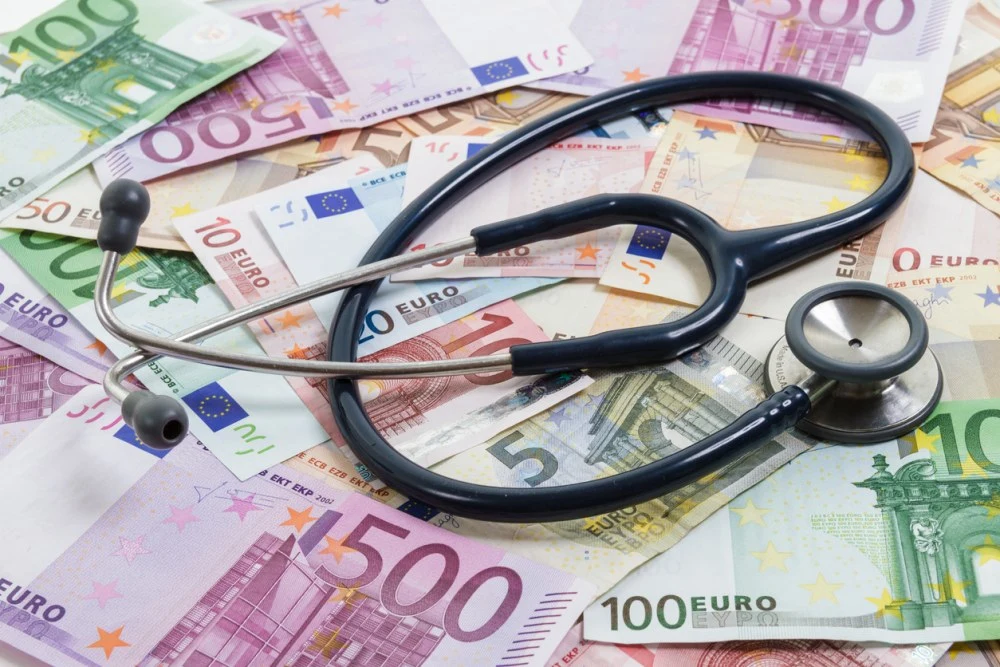 Healthcare costs and funding concept with stethoscope on euro banknotes&nbsp;