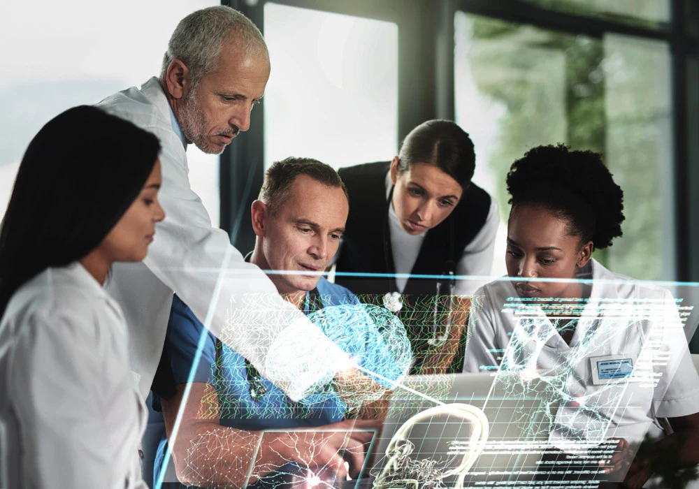 Diverse medical team analysing digital anatomy data on futuristic interface, highlighting collaboration and AI integration in clinical decision-making and precision healthcare.&nbsp;