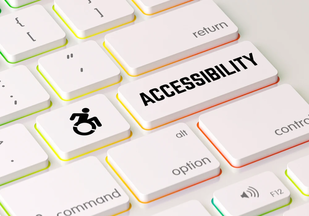 Keyboard with accessibility key and wheelchair icon promoting digital inclusion.
