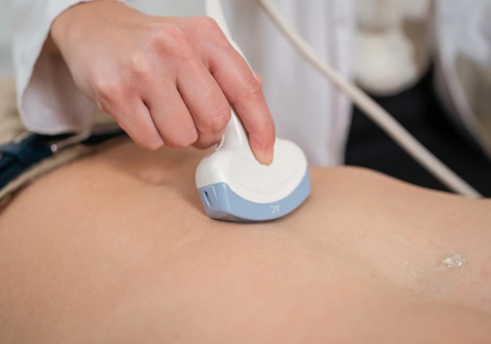 Abdominal ultrasound scan performed with a handheld transducer.&nbsp;