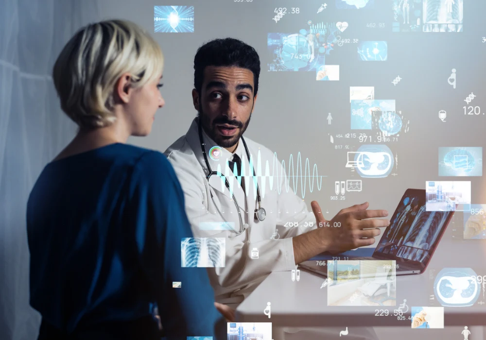 Doctor explaining medical data to patient using digital health technology and futuristic virtual interface.&nbsp;