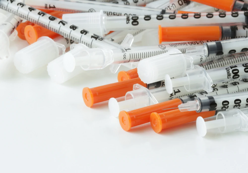 Pile of single-use medical plastics, illustrating hospital waste and the need for circular solutions.&nbsp;