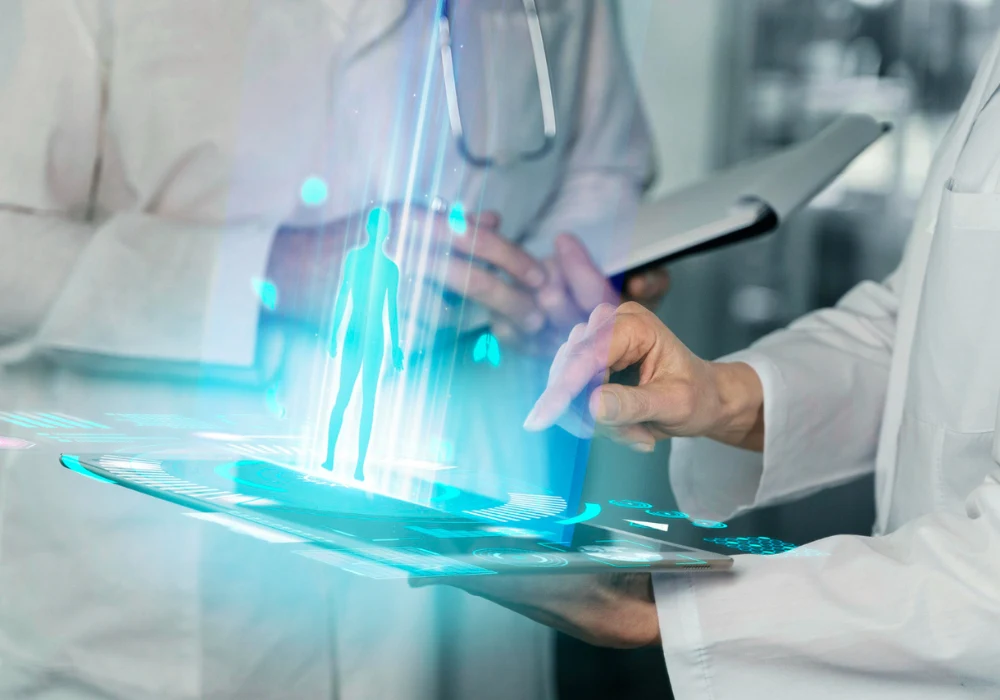 Clinicians using AI digital twin on a tablet for patient trajectory forecasting in hospital.&nbsp;