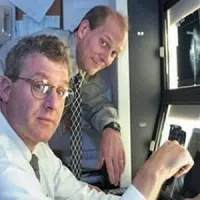 Dr. Keith Paulsen (rear), professor of radiology and surgery at Dartmouth