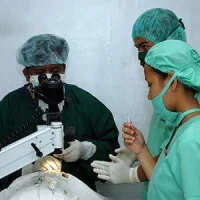 medical students assisting a surgeon
