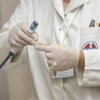 doctor handling medication