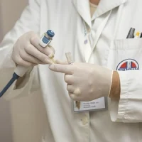 doctor handling medication