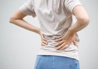 Enhancing Diagnostic Accuracy: Symptom Information in Lumbar Spine MRI