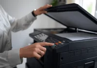 Fax Machine in Use &ndash; Sending Important Documents via Traditional Communication