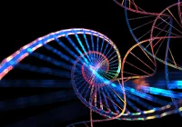  Colourful 3D rendering of DNA double helix structure on a black background, symbolising genetic science.&nbsp;