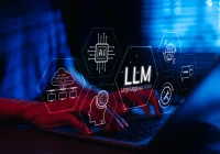 Concept of Large Language Model (LLM) with AI and machine learning icons over person typing on laptop&nbsp;