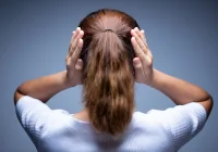 Woman covering her ears with hands, concept of stress and avoidance&nbsp;