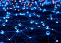 A digital network visualisation with glowing blue nodes connected by lines, symbolising data sharing, communication and connectivity between people or systems.&nbsp;