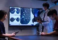 Clinician reviewing chest CT scan for COPD phenotyping, airway and emphysema assessment.&nbsp;