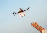 Medical drone delivering emergency supplies in a last-mile healthcare handover.&nbsp;