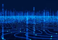 A glowing blue digital landscape with flowing grid lines and vertical data points,&nbsp;representing&nbsp;data networks, information&nbsp;streams&nbsp;and advanced technology&nbsp;visualisation.&nbsp;