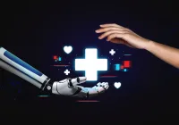 Human hand reaching out to robot hand with medical cross symbol, representing AI in healthcare and digital medicine innovation.&nbsp;