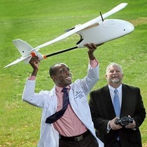 Dr. Timothy Amukele testing a drone courier Dr. Timothy Amukele testing a drone courier