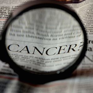 Cancer written in newspaper, credit Pixabay